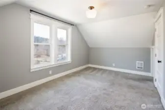 Upstair bedroom with view of Roslyn's forested Ridgeline.