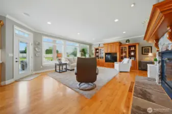 Built in entertainment center, entry to back patio with storm door