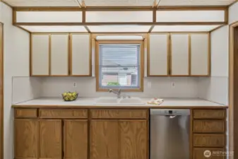 Kitchen with view to backyard & patio area.