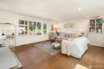 open room concept // living room with white shutters