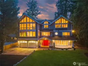 Professonally Stamped concrete driveway and tranquil water feature lead to your spacious covered front porch  welcoming your family & guests.