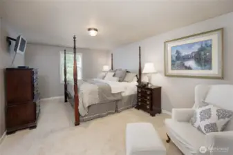 Primary Suite offers a full bathroom and a walk-in closet.