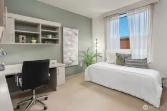 The Sencound Bedroom has a built in desk system perfect for a home office or student desk.