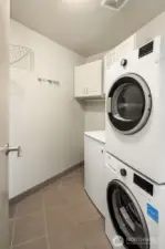 The in unit Laundry room comes stack washer and dryer as well as the freezer.