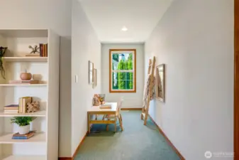 Located in upstairs bedroom, this charming dormer alcove is perfect for a reading nook, study area, or cozy play space.