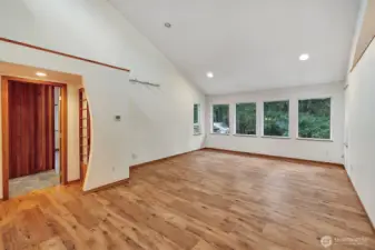 Large livingroom with soaring high ceilings