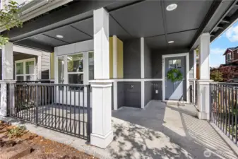 A covered, well-lit porch welcomes you home.