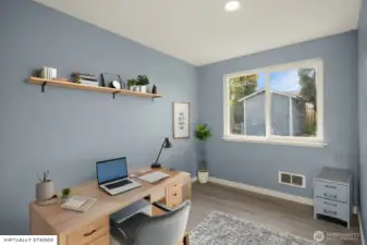 Versatile bedroom ideal for guest space, home office, or nursery.