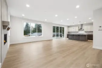 Spacious great room, with large windows makes this one of our favorite plans.