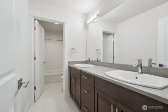 Main hall bath for the other two bedrooms.