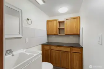 1/2 bath with storage on lower level