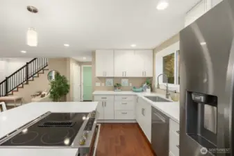 Brand new appliances- JennAir downdraft electric range, Bosch dishwasher and Samsung refrigerator.