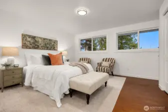 Primary Bedroom offers hardwood floors and territorial views.
