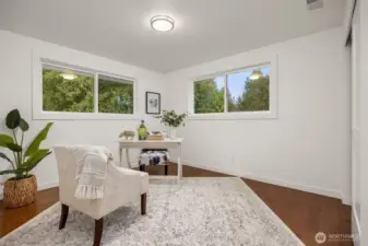 The 4th bedroom on the 2nd floor is featured as a home office