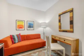 The den offers flexible space for a home office or overflow sleeping.