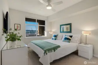 The primary bedroom comfortably accommodates a king bed and includes a walk-in closet and an ensuite ¾ bath.