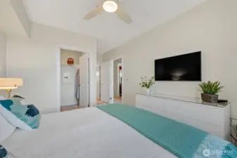 The primary bedroom comfortably accommodates a king-size bed and includes a walk-in closet and an en suite ¾ bath.