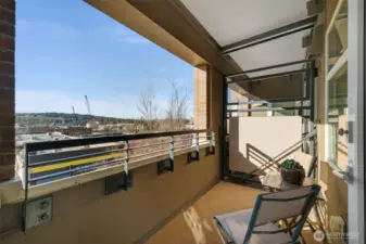 A private deck off the living room provides the perfect spot to unwind and take in the views.