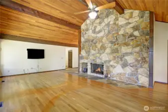 Tongue and groove ceiling plus grand fireplace.