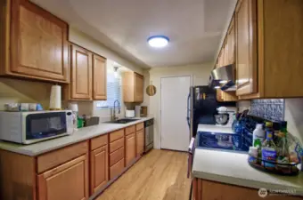 Another kitchen view looking towards the garage access door