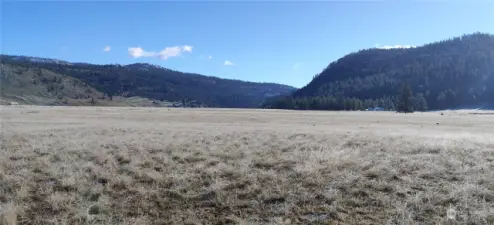 View to the east from front of property. 624 ft back from here.