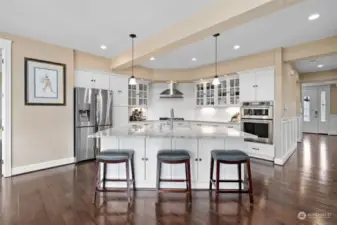 View of spacious kitchen open floor plan fades into spacious family room!
