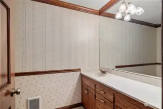This is a portion of the downstairs full bath.  It services the downstairs and main floor primary.  The shower is separate so   one of your guests can be showering while another can use the sink & comode.