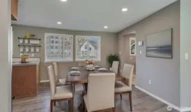 Plenty of space for everyone in this dining room, virtually staged.