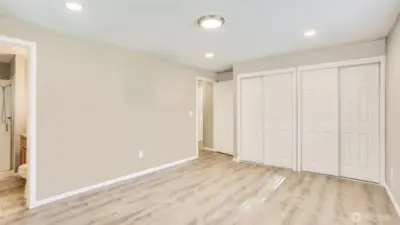 Huge primary bedroom with en suite bathroom.