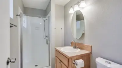 Enjoy a 3/4 bathroom in this home, located just off the primary bedroom or great as main office with private bathroom.