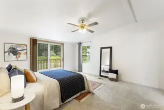 Primary bedroom with access to front deck.