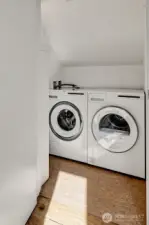 ASKO washer and dryer are conveniently on same level as bedroom.