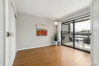 Second bedroom w/closet and french entry door. Also large slider to the covered back deck.