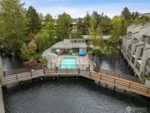 Outdoor pool is connected to all the buildings by walkways.