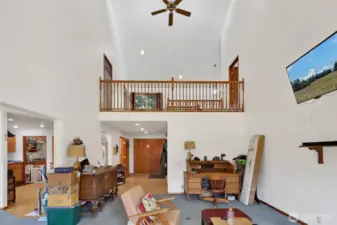 Soaring vaulted ceiling at main floor living room.
