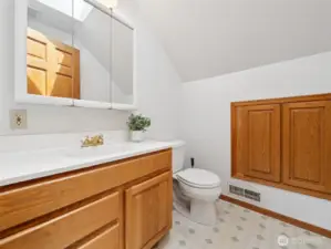 Upstairs half bath.
