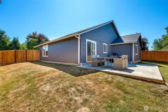 The corner lot with the brand new fence makes the yard feel very spacious.