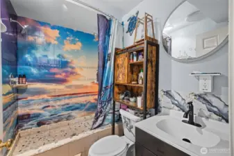 Downstairs bathroom with custom shower.