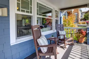 A true Craftsman front porch with room to sit and watch the Fall colors change. The home features all-new windows that replicate the original design.