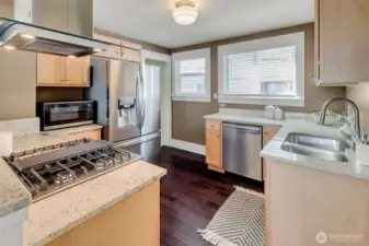 Full suite of stainless steel appliances.