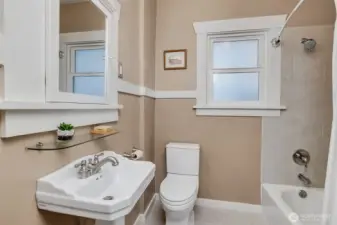 Main level Full tiled bath.