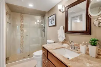 Primary ensuite ¾ tiled bath.
