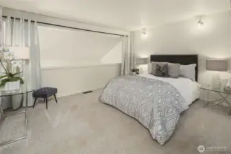 Upstairs, the generous loft-style primary suite provides a peaceful retreat with space to relax, recharge, or create your own cozy corner.