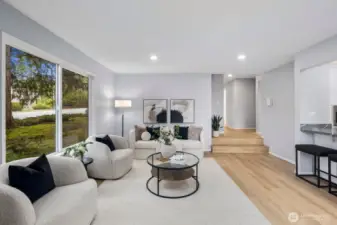 Warm, inviting, and effortlessly livable, this residence has been remodeled with new flooring, paint, kitchen, and bathrooms