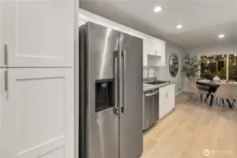 Cabinet space is plentiful for all of your cooking gadgets and kitchen storage needs