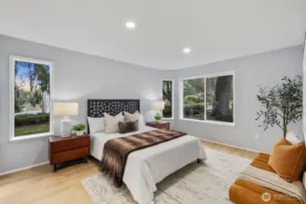 The primary bedroom tucked in the back of the unit creates privacy and peace for retreating each day