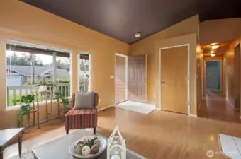 Hallway leads to all 3 bedrooms and 2 bathrooms