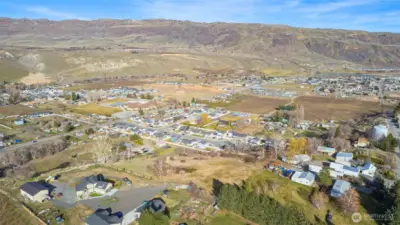 Topography includes a gradual slope at the rear of the property, maximizing view potential and offering increased privacy with no immediate neighbors behind. Ideal for positioning a custom home to capture both scenery and seclusion.