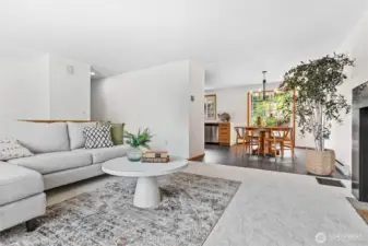 Living opens to dining, kitchen & back deck. Fresh paint throughout.