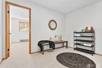 Downstairs landing area. Would make an excellent area for another office, or kitchenette for those setting up an in-law suite.